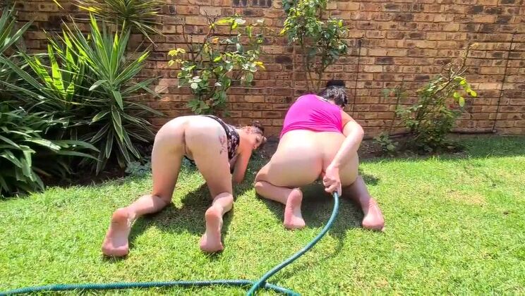 two girls inserting hose pipe in our asses and squirting the water out