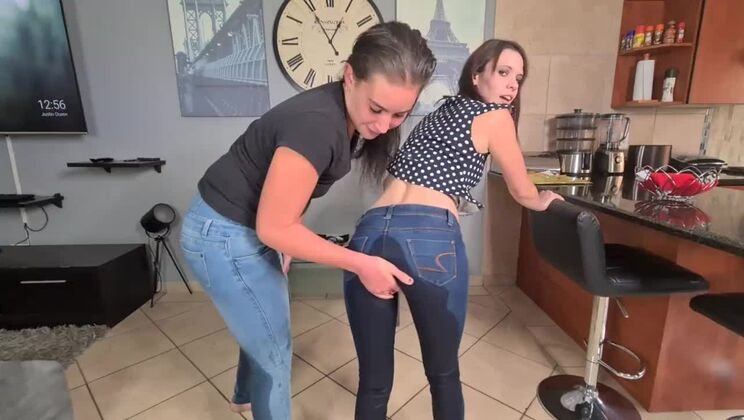 Two piss sluts soaking and wetting their jeans with pee and starts getting undressed afterwards
