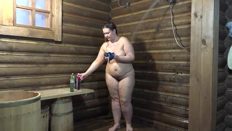 Mature BBW with a beautiful ass in the shower fucks her hairy pussy with a big bottle of shampoo and shows her gaping hole Home fetish