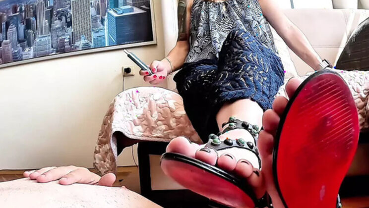 Mistress YammyBoots Dominates Slave with Footjob & Humiliation