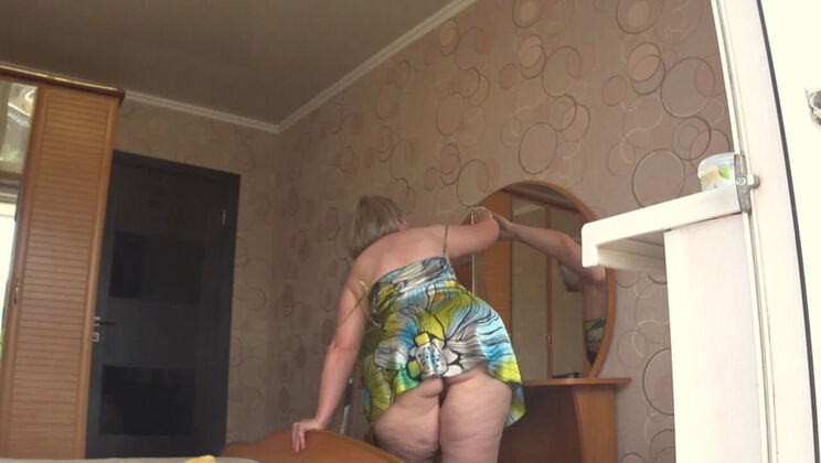 Neighbor Spies On Busty Mature Housewife Through Open Window