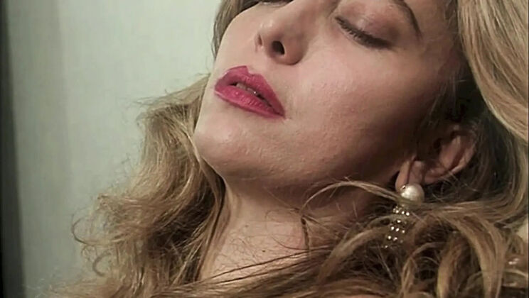 Moana Pozzi Licks Boss Pussy and Gets Fucked Doggystyle in Vintage Italian Scene