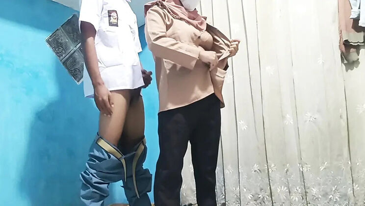 Indonesian Hijab Teacher Rania Fucks Student Dinda Doggy Style at Home - Big Natural Tits & Hairy Pussy