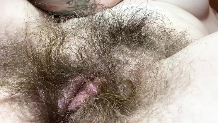 Hairy amateur girl masturbates her big clit close up - homemade pussy rubbing orgasm